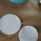 Cut out a circle of felt the same size as the lid and glue it on.