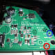 I first used my soldering iron to heat up the solder pad in the red circle and as it melted, I gently pulled the red wire from the motherboard. Then soldered my new wire on to the solder patch in the blue circle.