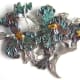 Fine silver large iris brooch constructed from multiple layers of PMC components each each pressed into a detailed botanical rubber stamp. Embellished with 24k gold (Accent Gold for Silver), petals colored with an iridescent liver of sulfur (LOS) pat
