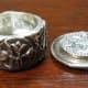 Fine silver lidded box - open, side view, shows mirror finished interior walls contrasting with textured exterior.