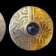 Fine silver clip earrings, textured with two tear-away textures taped side-by-side. Embellished with 24k gold foil applied with the keum-boo method and two lab sapphire cabochons set in wide fine silver PMC bezels and fired in place.