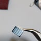 Use the bent nose pliers to start extracting pins.