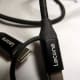 Note the rubber strain relief with lanyard that runs between connector and adapter of Lecone 4-in-1 Multi USB Charging Cable