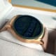 Wear24 smartwatch. Watch faces dim after a few seconds to conserve battery power.