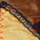 Lace strip decorated with grub roses and knots