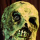 Zombie, buried six feet deep, come and eat my brains, you creep!