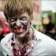 Devouring the brains of his prey, he dug right in. He didn't bother to clean the guts from his chin.