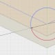 Trim away the excess arc (the part overlapping the tray walls).