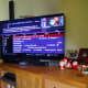 TV angled on sideboard with all the tangle of cables hidden behind it, and out of sight.