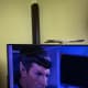 I stuck the Wii sensor on top of the TV screen with blu-tack.
