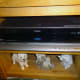 Our Blu-ray player, with Internet and Intranet access; and below, our Samsung 7:1 Dolby Digital surround sound home theatre system.