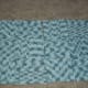 Make a rug with double crocheted squares