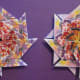 Look closely above and you will notice that these two stars are opposite. The second star was interlocked clockwise. Hint: Before you are ready to assemble your star try it both ways to see which is more attractive.