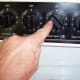 Keep your double boiler on low heat. The slower you melt your wax, the less likely it is to burn or catch fire.