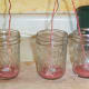 Be sure to keep your wicks straight as you slowly add melted wax to your jar.