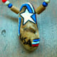 First a design was wood burned in to the driftwood. Then the polyurethane was applied and left to dry overnight.
