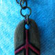 I attached jump rings to this pendant and promptly turned the piece in to a charm for a bracelet.