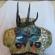 Pottery, stained glass and shed deer antler, vintage costume jewelry