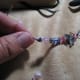 4. Knot holds beads.