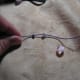 2.Make double knot about 3-4 inches from end of hemp cord. Add first bead and make sure it won't go past knot.