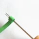 Roll the strip of paper to form a coil.