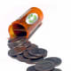 The tall pill bottles can hold up to $10 worth of quarters.