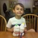 My son proudly displaying our sock snowmen!