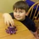 My son proudly showing off his finished octopus!