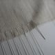 Lacing the first two edges together, sewing 2cm in from the edge of the fabric.