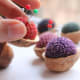 I don't know if these pincushions are filled with ground shells, but that would add the perfect touch to this idea.