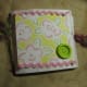 Cover with rick-rack and button