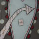 Julie combines different types of paper and different color threads.