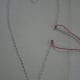 Julie uses two different colors of thread for this project and then ties the threads together on the back side of her work.