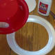 Use glue to attach bowl to ring of paper plate.