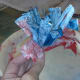 Wrap up middle of coffee filter to resemble a firecracker.
