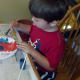 My son working hard on his coffee filter.
