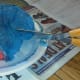 Cut slits into the outer edge of the coffee filter.