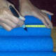 Measure and mark the areas to insert the pipes.