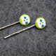 I added self adhesive rhinestones to this pair of button hair pins.