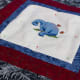 Turn over, and pin through all layers, starting from the inside of the design.