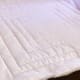 The back of the front of the pillow - you can see the quilting lines in two different color threads.
