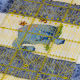 Using center pin in the design, align the side strips with a ruler, wrong side up, and pin.