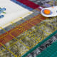 Trim the pillow front to an even width, leaving a little for the final seam.