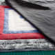 Lay the backing fabric on the front of the design.