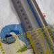 Measure the first strips from the center point, equal distance apart with two rulers.