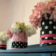 Covered can vases