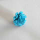 Press the fringes down to form a flower
