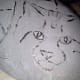 Rough outline of facial features.