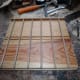 Runner strips glued in place in the slots cut in the side panels with the aid of the jig