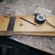 Using the tape measure, pencil and square to mark a line for the next cut